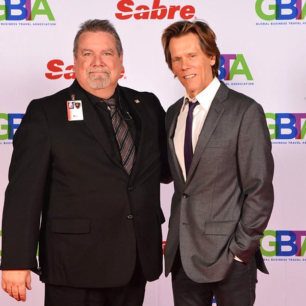 Kevin Jordan of American Central Force on protection detail with Kevin Bacon
