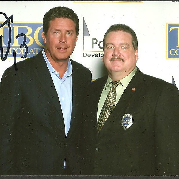 Kevin Jordan of American Central Force on protection detail with Dan Marino
