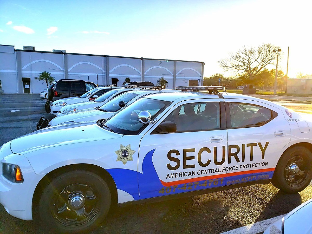 American Central Force security operator monitoring live surveillance feeds